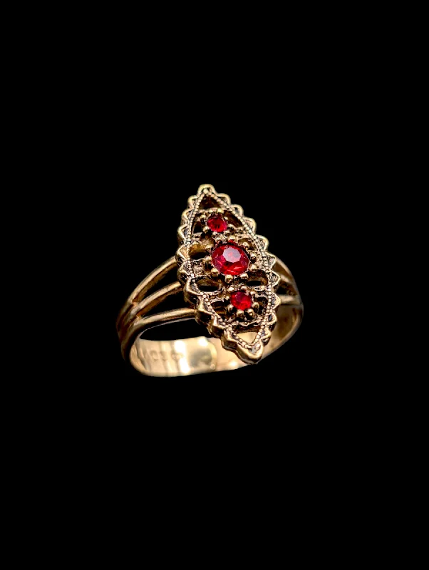 Rings with branch-inspired bands for organic -Vintage Simulated Ruby Sarah Conventry Gold Toned Adjustable Costume Ring