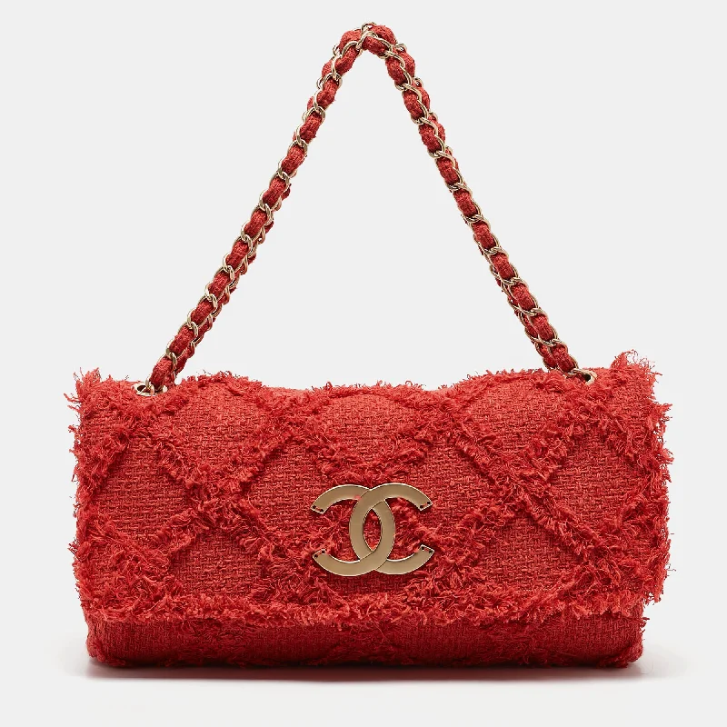 Handle bags with suede accents for texture -Chanel Red Diamond Stitch Tweed Maxi Nature Flap Bag