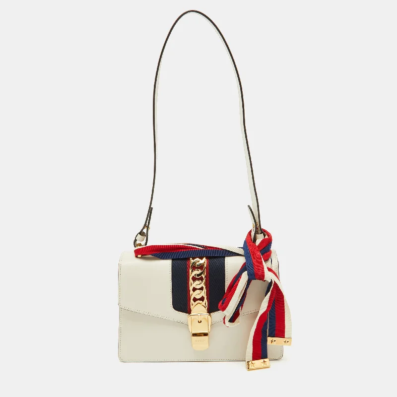 Handle bags with sturdy leather grip accents -Gucci White Leather Small Web Chain Sylvie Flap Shoulder Bag