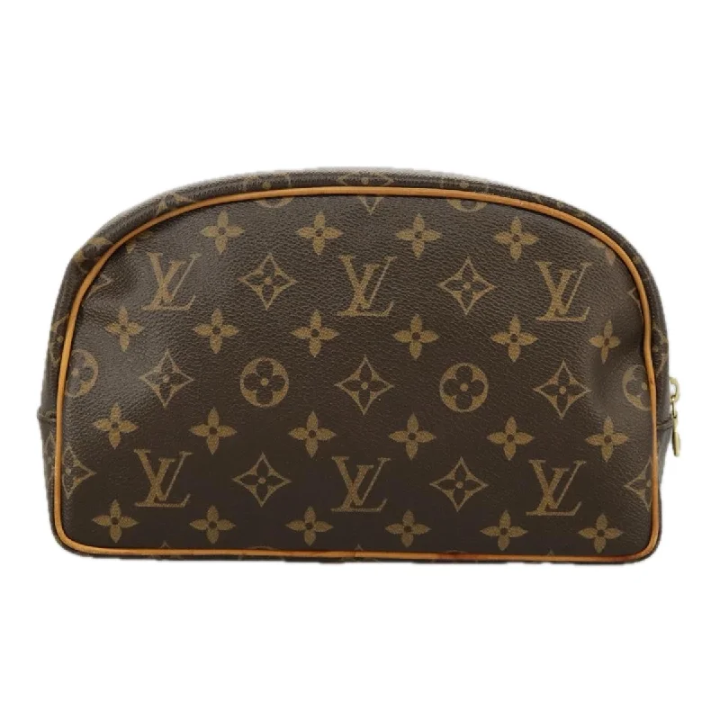 Handle bags with reinforced stitching for durability -Louis Vuitton Trousse De Toilette  Canvas Clutch Bag (Pre-Owned)