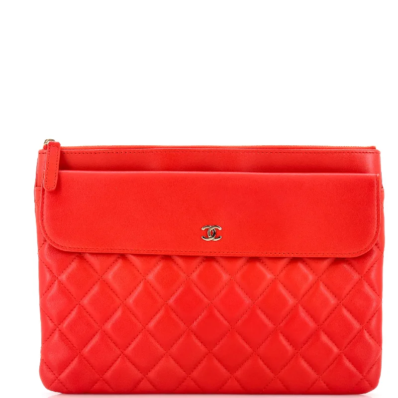 Handle bags with perforated details for style -O Case Flap Clutch Quilted Lambskin Medium