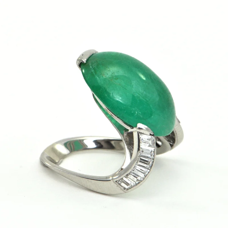 Rings with gothic-inspired skull motif details -Mid-Century 20.1 ct Emerald Cabochon and 1.1 ct Diamond Retro Platinum Ring