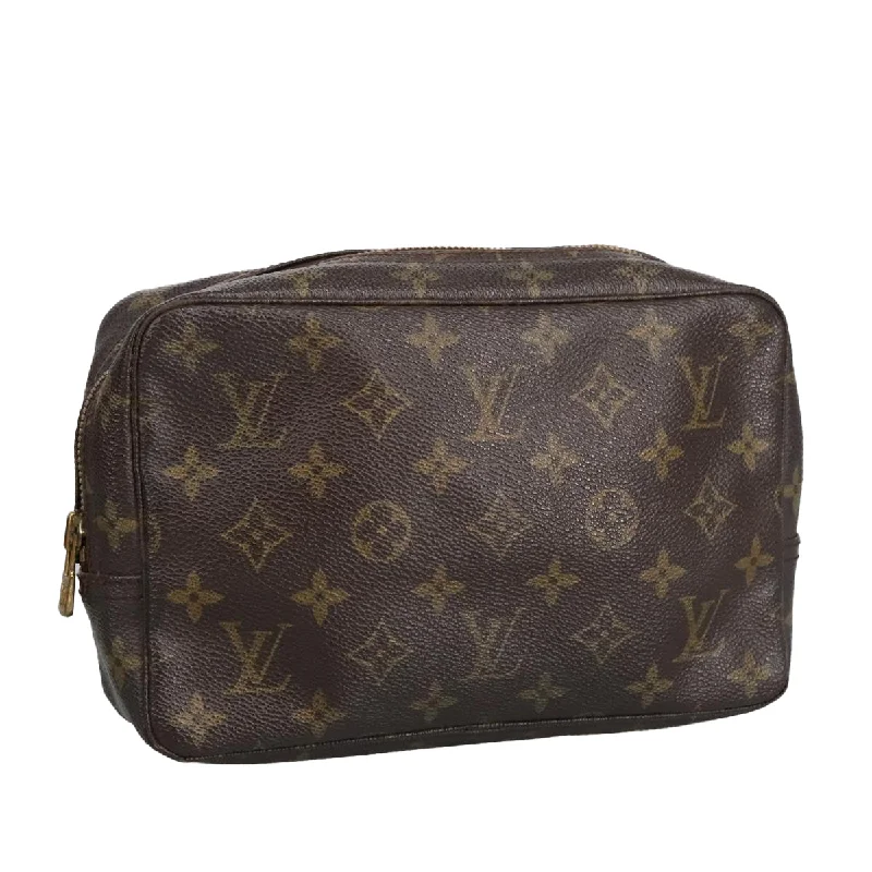 Handle bags with sturdy canvas for longevity -Louis Vuitton Trousse De Toilette  Canvas Clutch Bag (Pre-Owned)