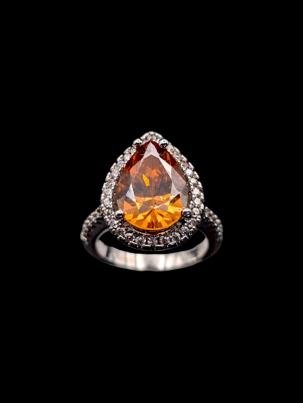 Rings with raw garnet stones for texture -Vintage Pear Cut Simulated Citrine with Simulated Diamond Halo Silver Toned Costume Ring