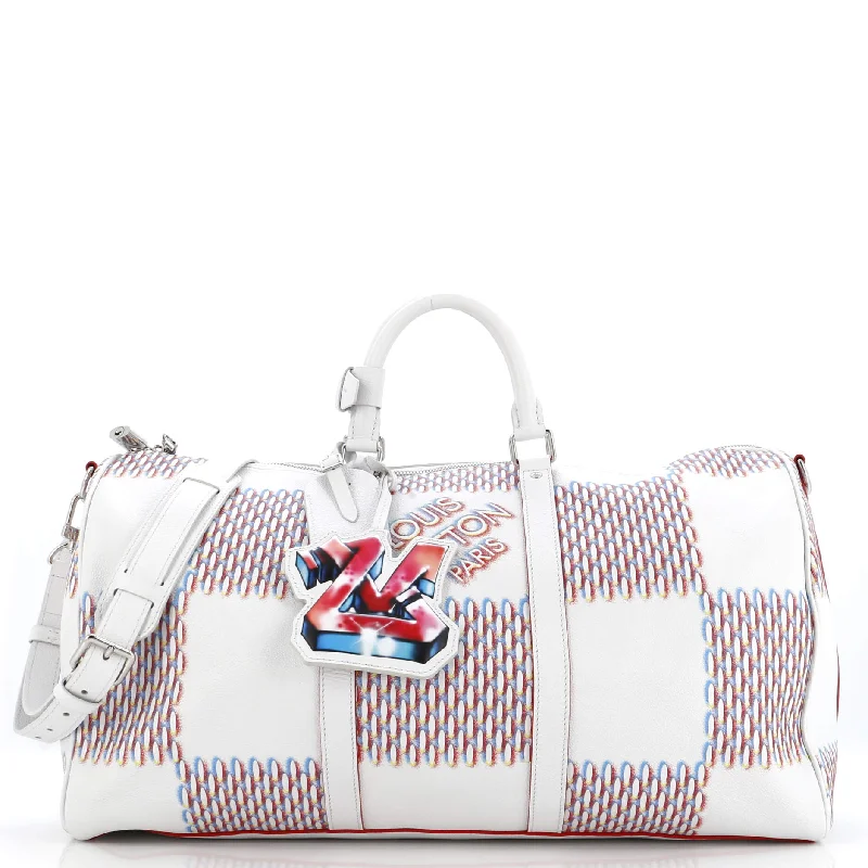 Handle bags with floral prints for spring -Keepall Bandouliere Bag Limited Edition Damier Spray Leather 50