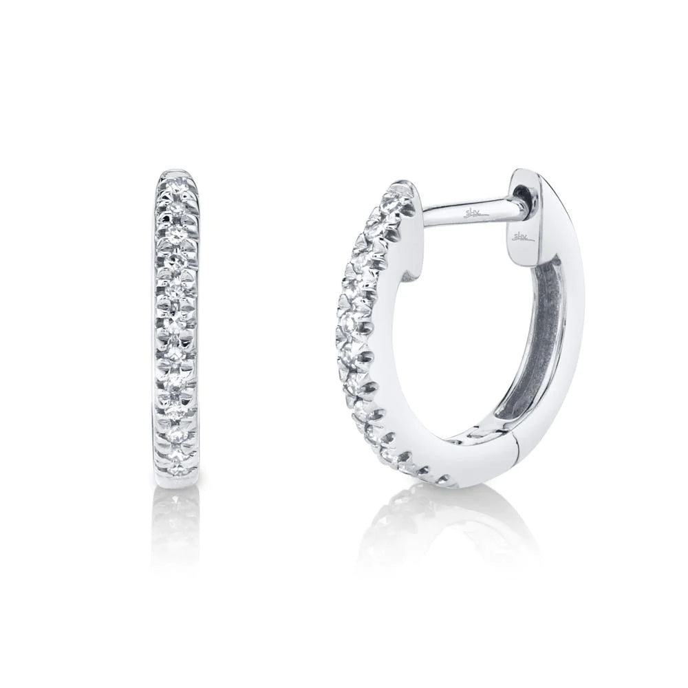 Rings with spiral designs for eye-catching twist -0.07ctw Diamond Huggie Earring