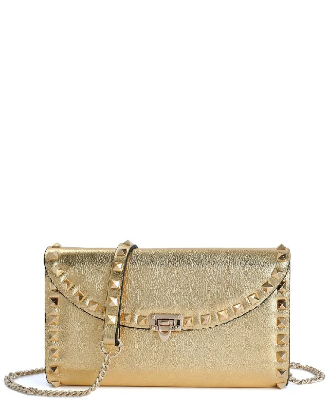 Handle bags with rustic leather for charm -Tiffany & Fred Paris Studded Leather Clutch