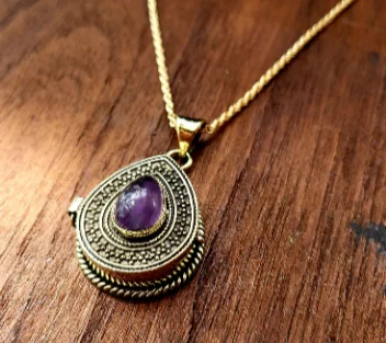 Beautiful necklaces and pendants with butterfly motifs for a whimsical style-Amethyst Teardrop Locket Necklace